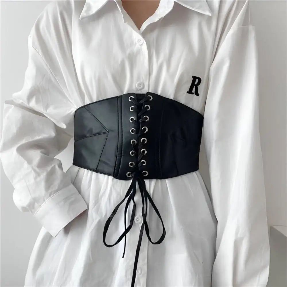 Black lace-up corset belt made of faux leather with adjustable design