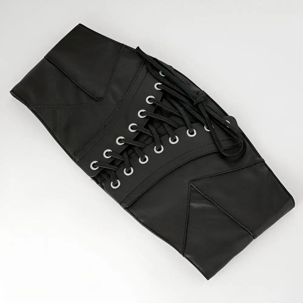 Black faux leather corset belt with lace-up design ideal for fashionable waist cinching