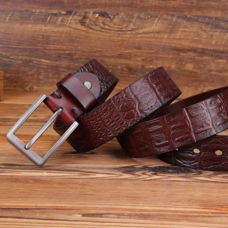 Brown leather belt with a silver buckle suitable for casual and formal wear