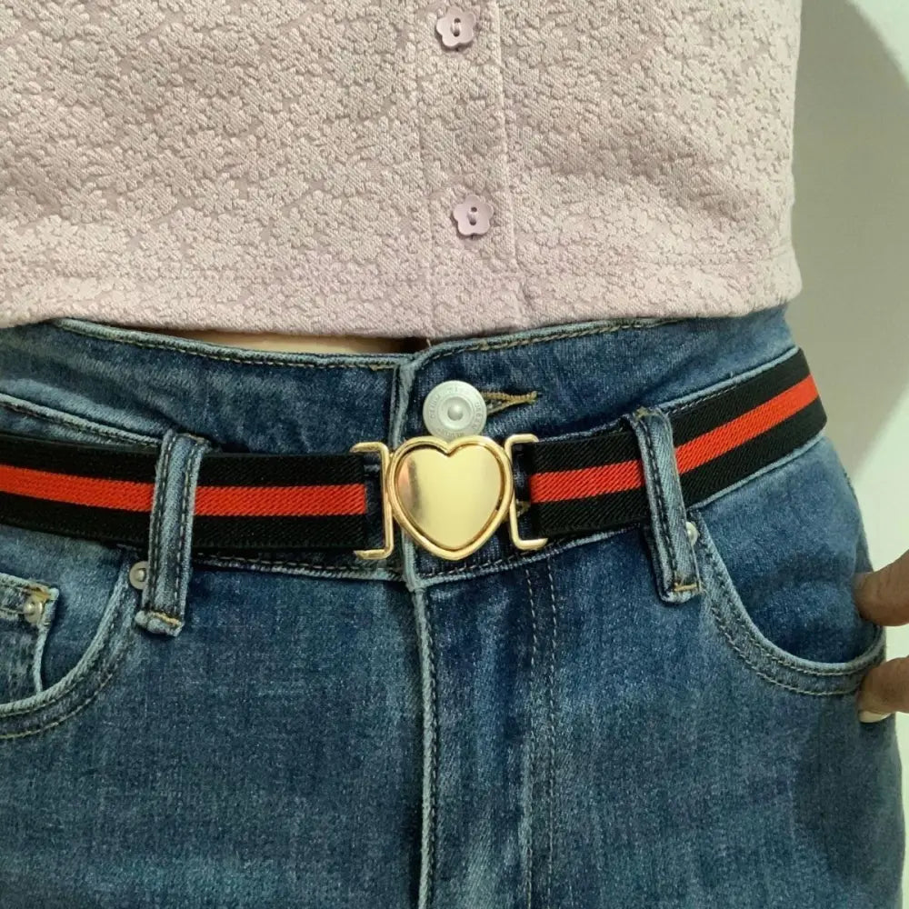 Assorted elastic belts featuring heart-shaped buckles and striped designs