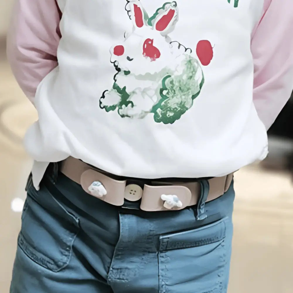 Child’s wardrobe accessory featuring a yellow elastic belt with decorative bunny embellishments