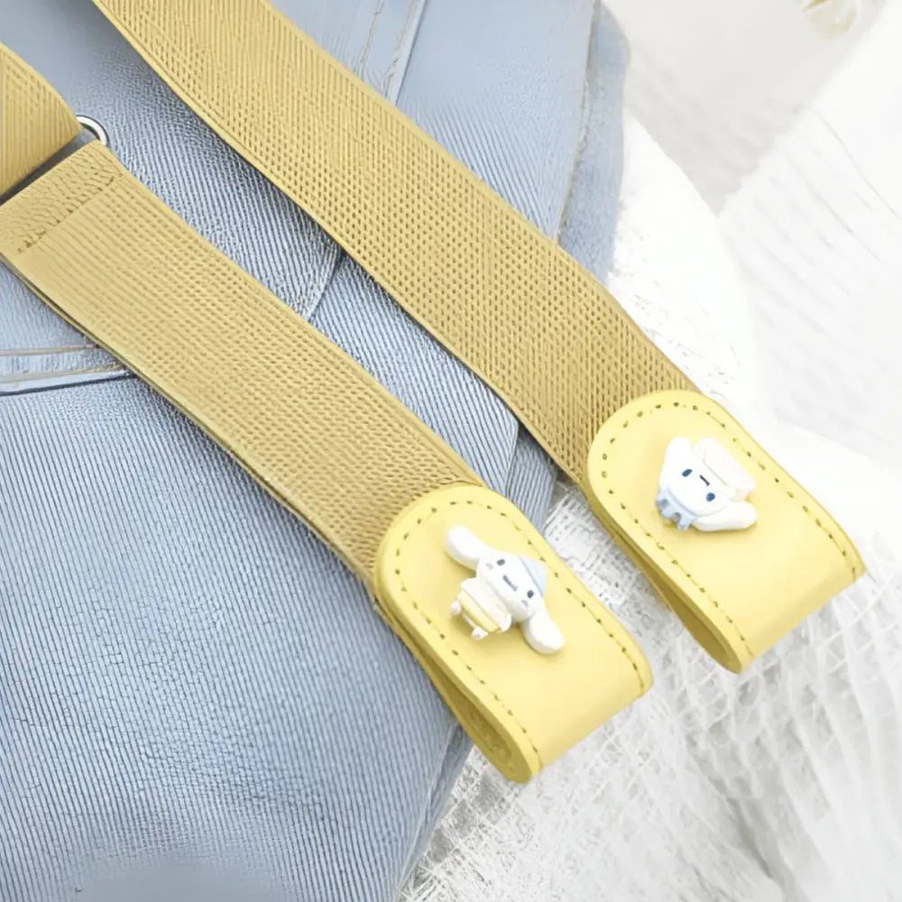Yellow elastic belt with bunny embellishments, perfect for a child’s wardrobe accessory