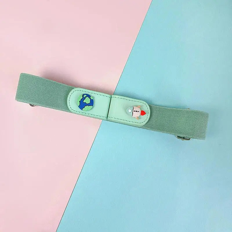 Mint green elastic belt with space-themed embellishments and cartoon button details