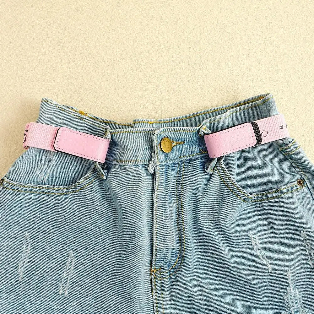 Light blue denim shorts with pink belt loops and Erwin buckle-free belt for style