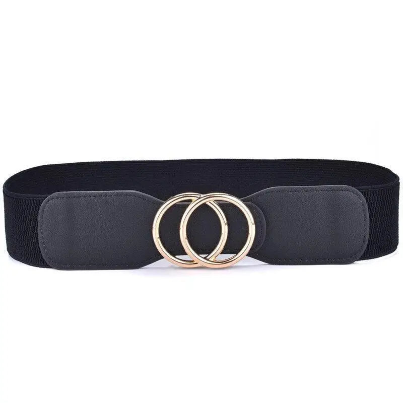 Black elastic belt with gold double-ring buckle paired with Cream Ribbed Dress