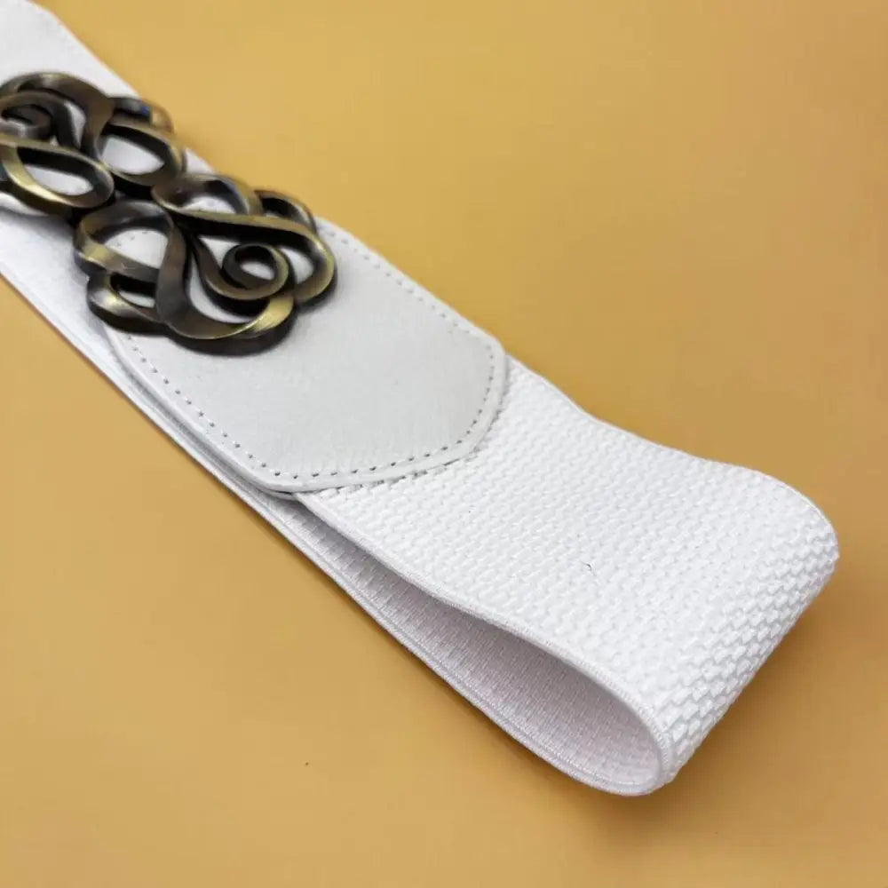 White elastic belt with bronze-colored buckle from the Natasja Elastic Belt Collection