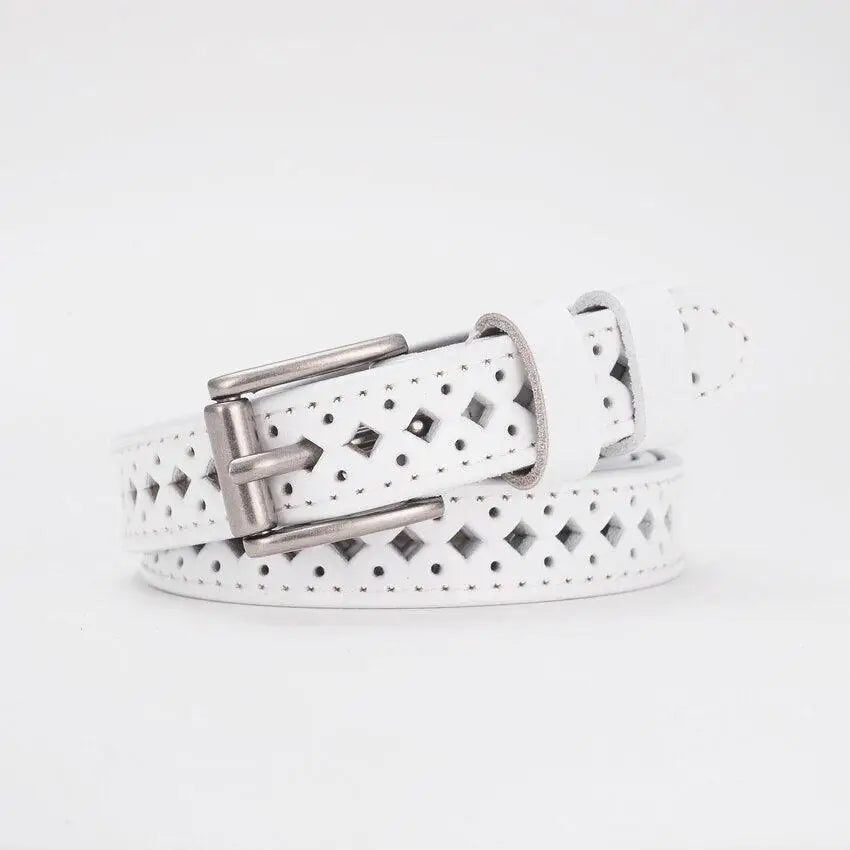 White perforated leather belt displayed with Distressed Denim Shorts with Red Leather Belt