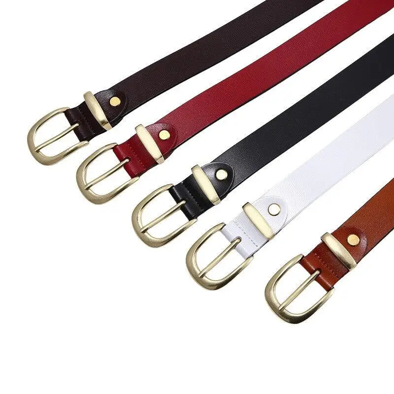 Assorted leather belts with metal buckles including a golden buckle for Distressed Blue Jeans