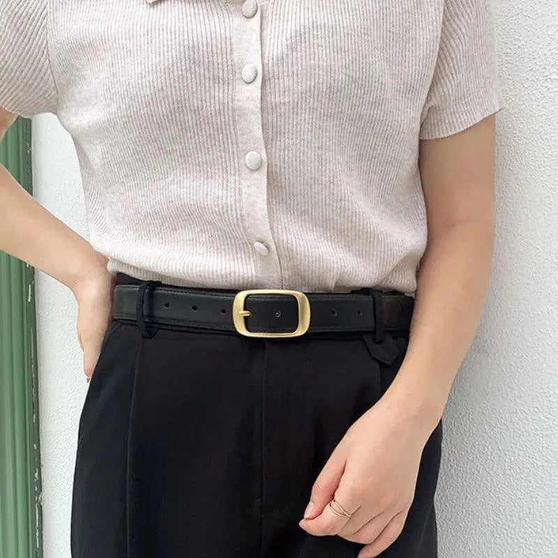 Elegant leather belt with gold buckle for women showcasing sophisticated accessory style