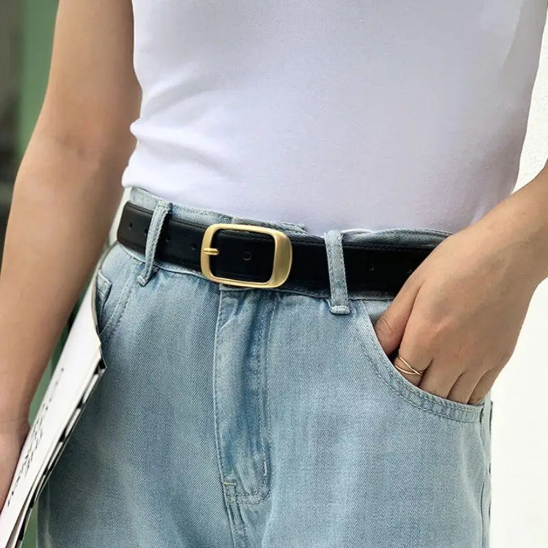 Elegant leather belt with gold buckle for women, stylish accessory for formal wear