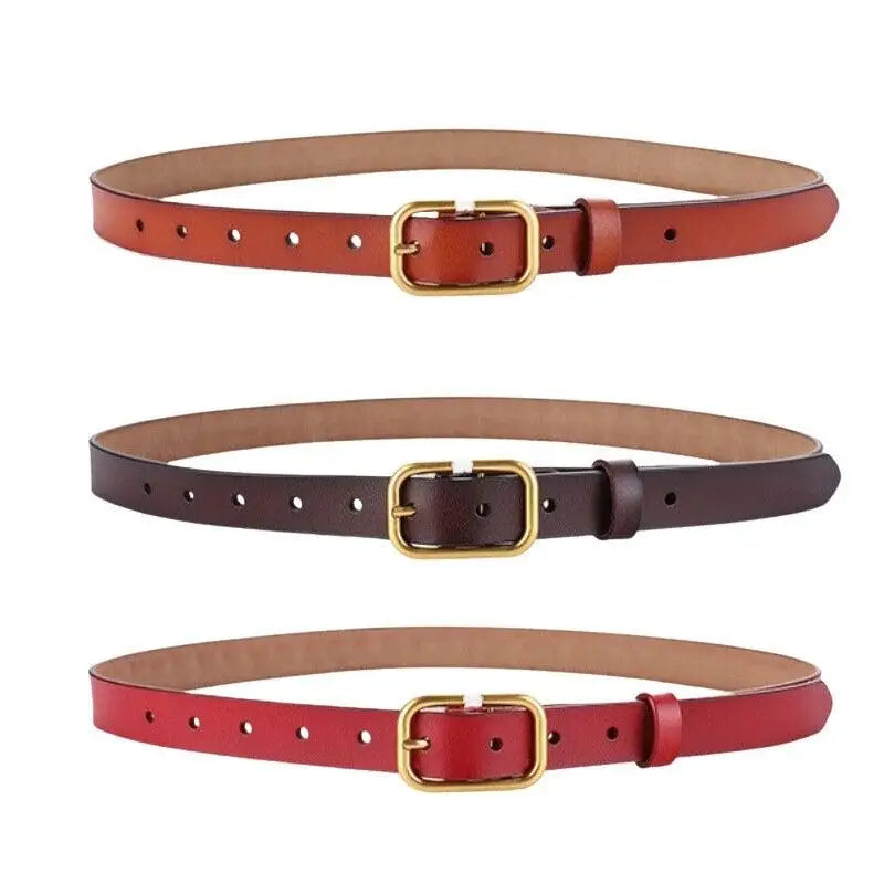 Set of three leather belts with gold buckles displayed for stylish accessories