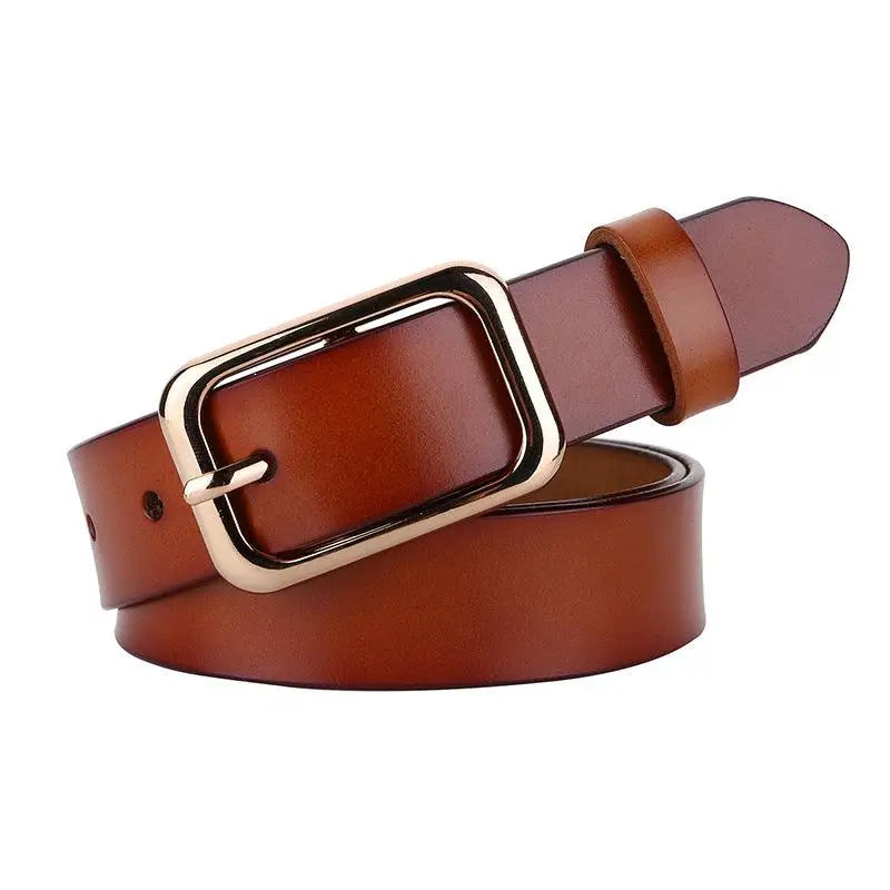 Brown leather belt with a gold buckle showcased in Women’s Outfit with White Sweater and Blue Jeans