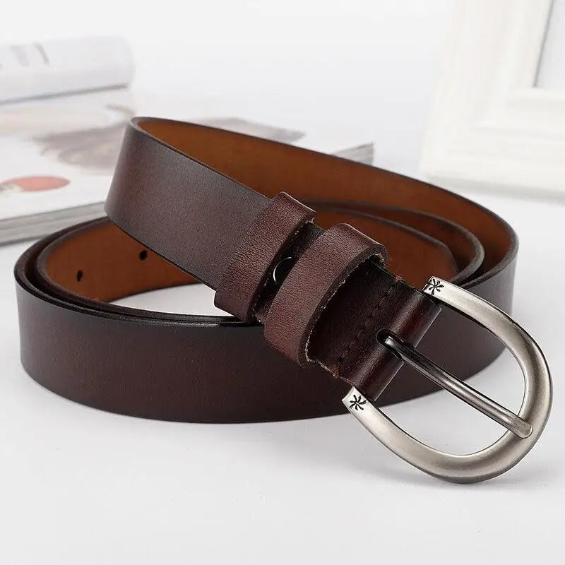 Assorted brown leather belts with silver buckles displayed in a product image