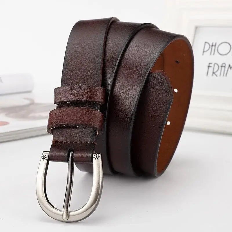 Assorted Brown Leather Belts with Silver Buckles showcasing a brown leather belt with a silver buckle