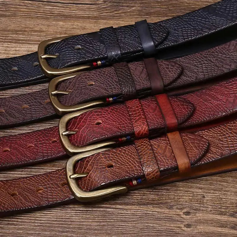 Assorted leather belts with brass and silver buckles for men and women, stylish leather belt