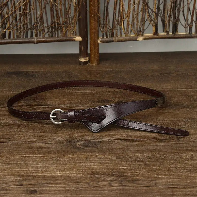 Priya Belt Collection of Leather Belts with Metal Buckles featuring a brown leather belt with silver buckle