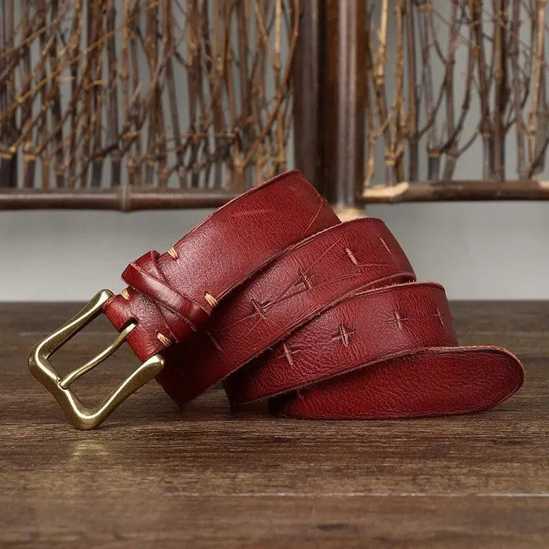 Red leather belt with brass buckle for stylish and durable accessory