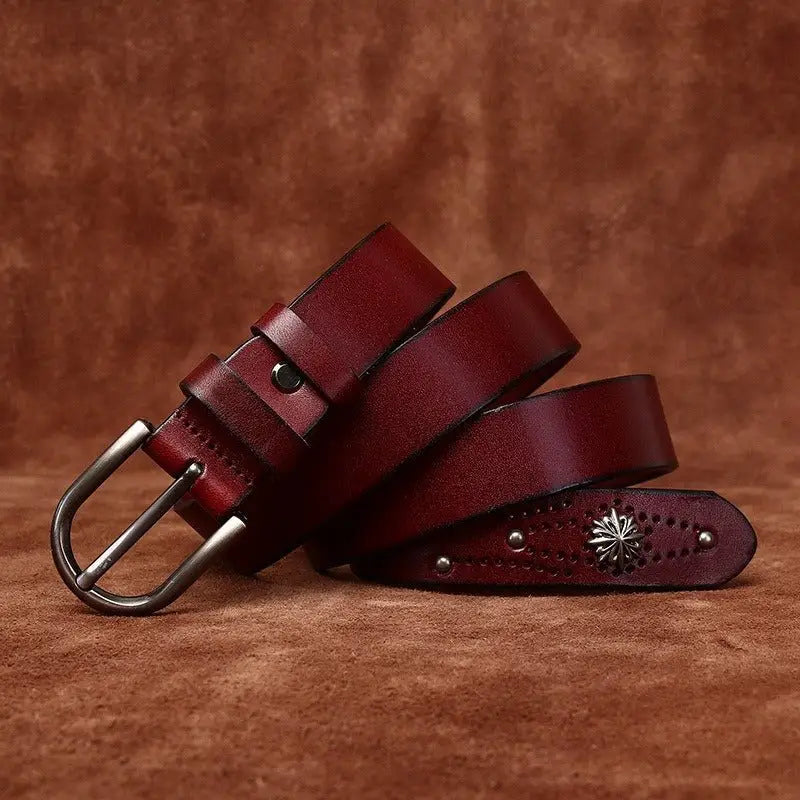 Maroon leather belt with silver buckle and embellishments for stylish accessories