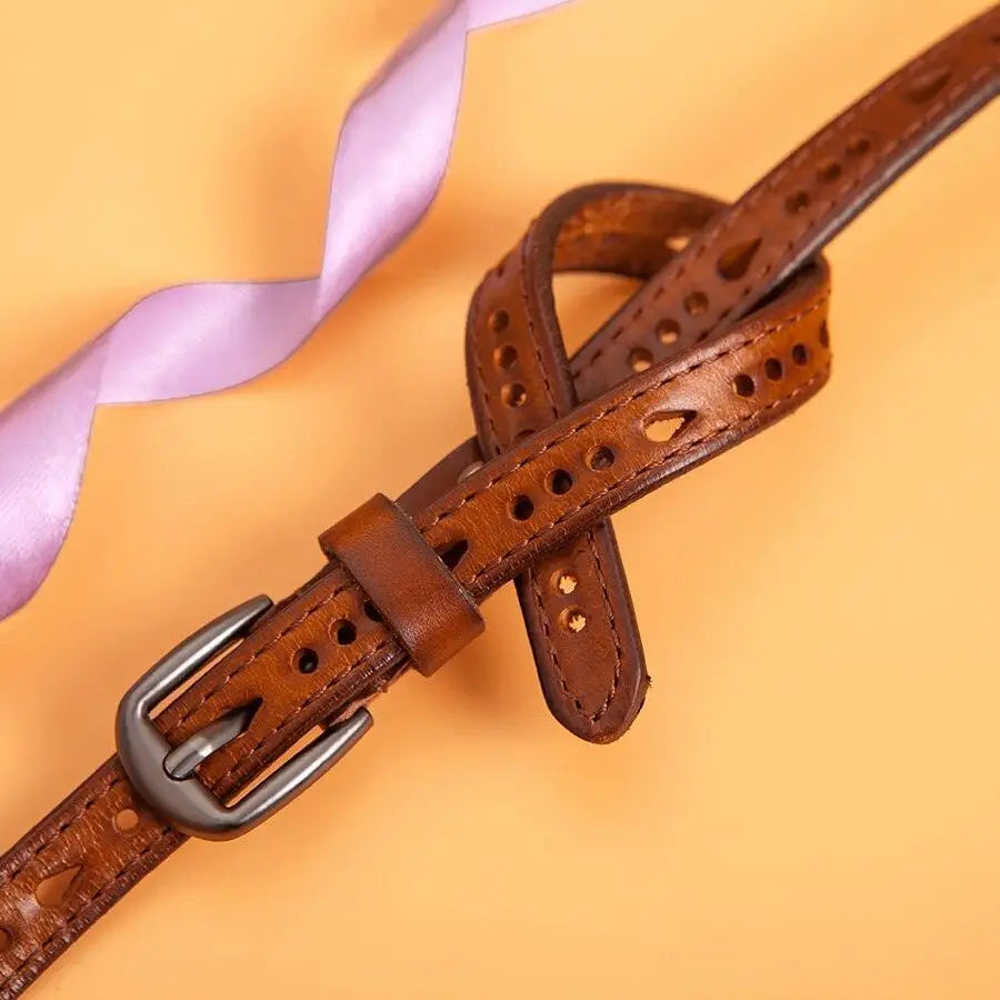 Anei Leather Belt with Metal Buckle and Knot Design showcasing brown leather and stylish knot