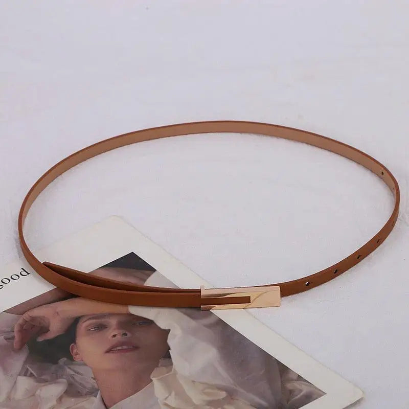 Thin brown women’s leather belt with gold buckle from Women’s Leather Belts in Black and Gray collection