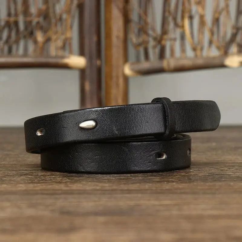 Black leather belt with stitched edges and silver buckle for stylish accessories