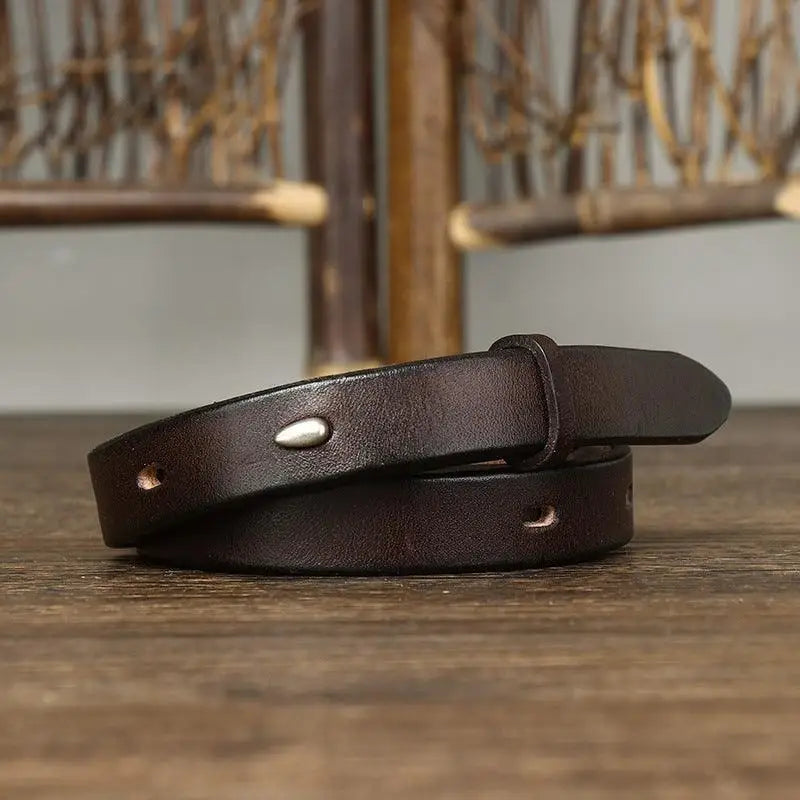Brown leather belt with stitched edges and silver buckle, stylish and durable accessory
