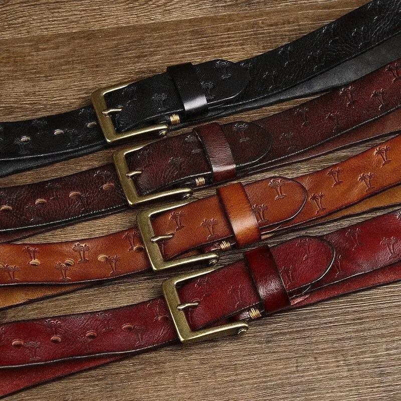 Assorted women’s leather belts with palm tree pattern and metal buckle for stylish wear