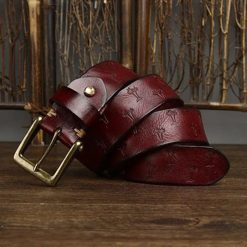 Women’s leather belt with brass buckle and palm tree pattern for stylish accessories