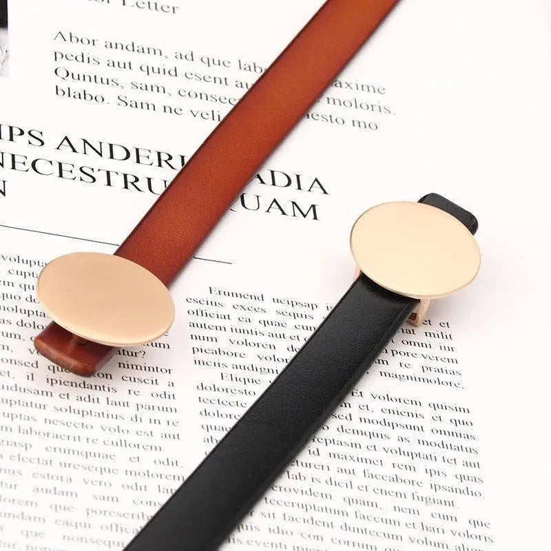 Kira Leather Belt with Round Buckle in Multiple Colors showcasing two leather belts