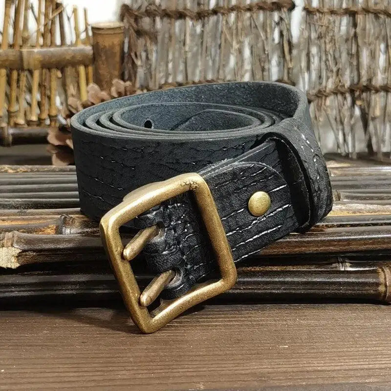 Set of four black leather belts with brass buckles for stylish, durable accessories