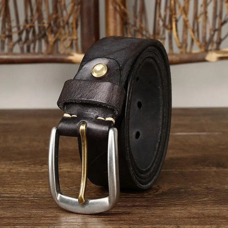 Rolled dark leather belt with silver buckle from Assorted Brown and Maroon Leather Belts