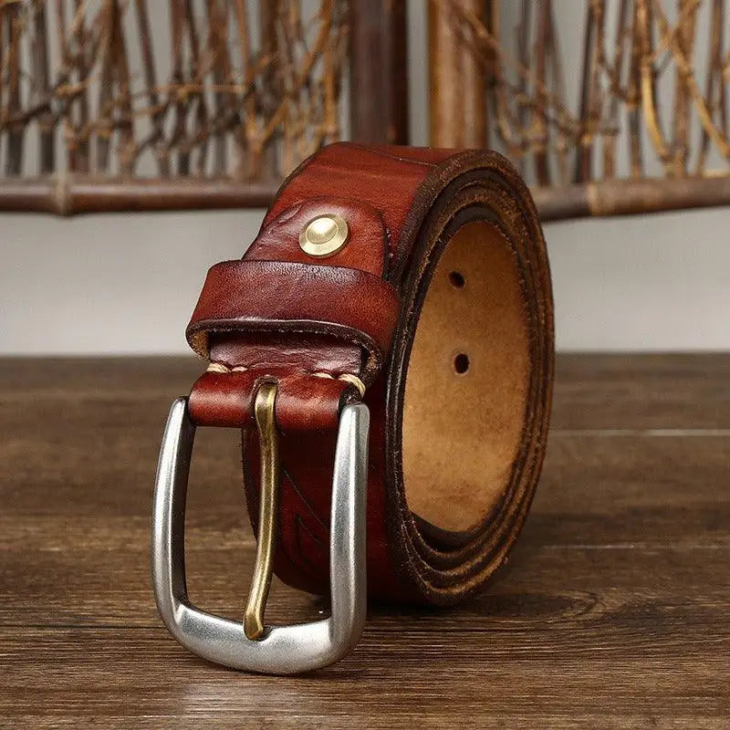 Rolled brown leather belt with silver buckle from Assorted Brown and Maroon Leather Belts