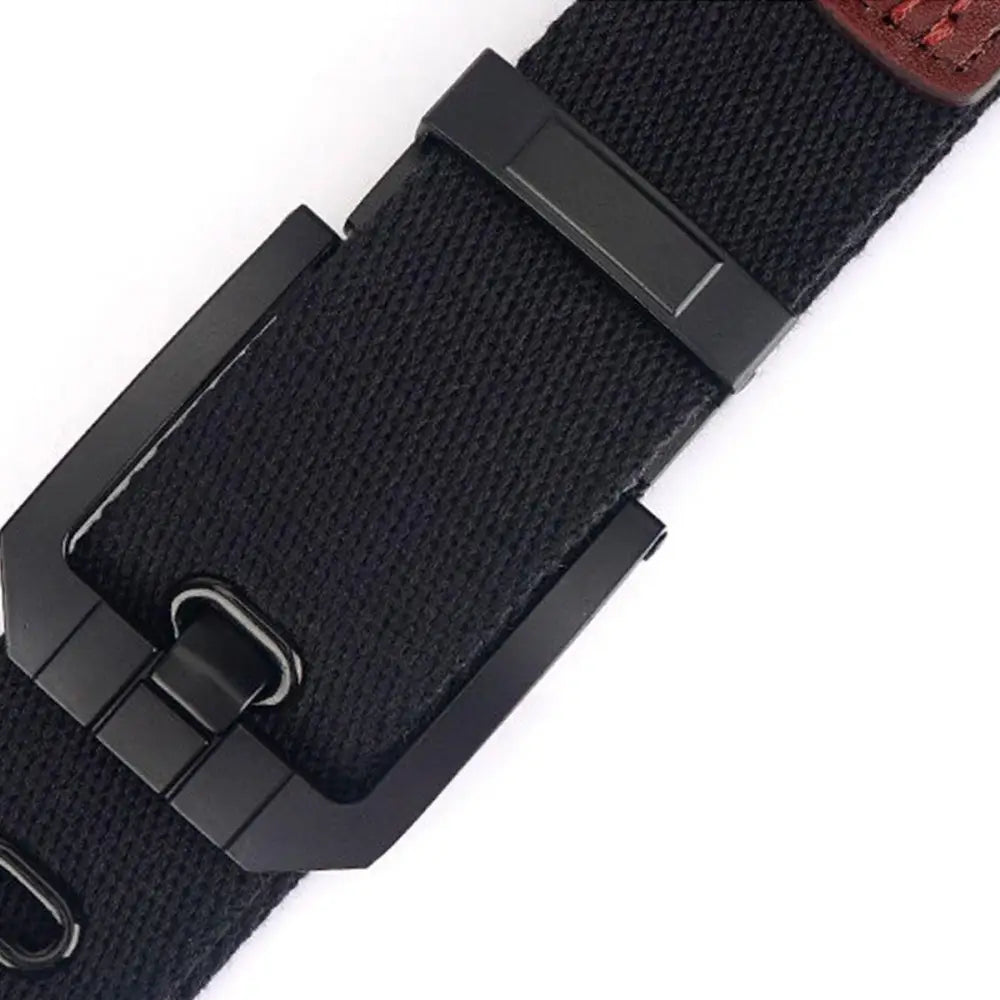 Black canvas belt with metal buckle highlighting aesthetic appeal and black buckle detail