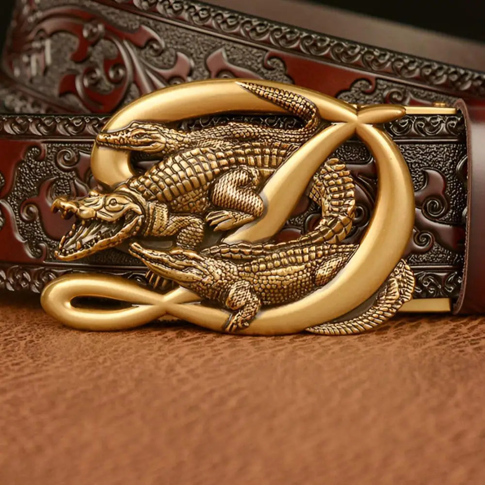 Embossed leather belt featuring an ornate crocodile-shaped buckle for stylish sophistication