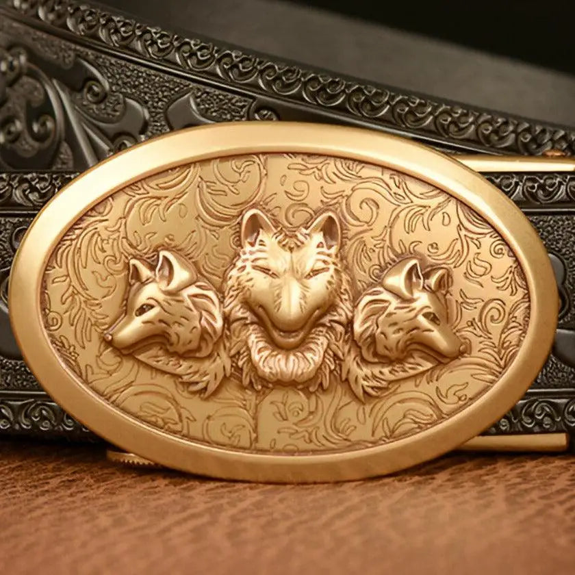 Gold-colored belt buckle with three wolf heads from Esprit Animal style leather belt