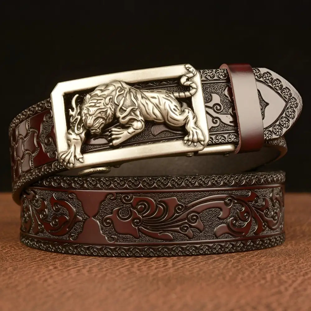Embossed leather belt with a detailed tiger buckle for a stylish accessory option