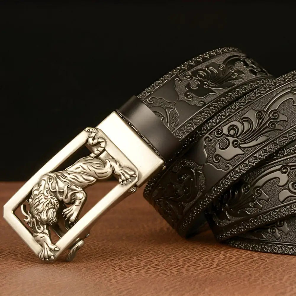 Embossed leather belt featuring a striking tiger-shaped buckle for stylish accessories