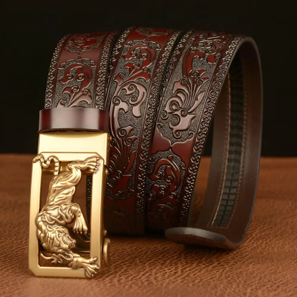 Embossed leather belt featuring a bold tiger-shaped buckle for stylish accessories