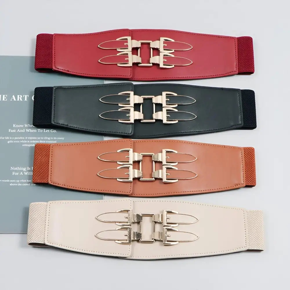 Four elastic waist belts with buckle details in large XXL and extra large sizes with gold and silver buckles