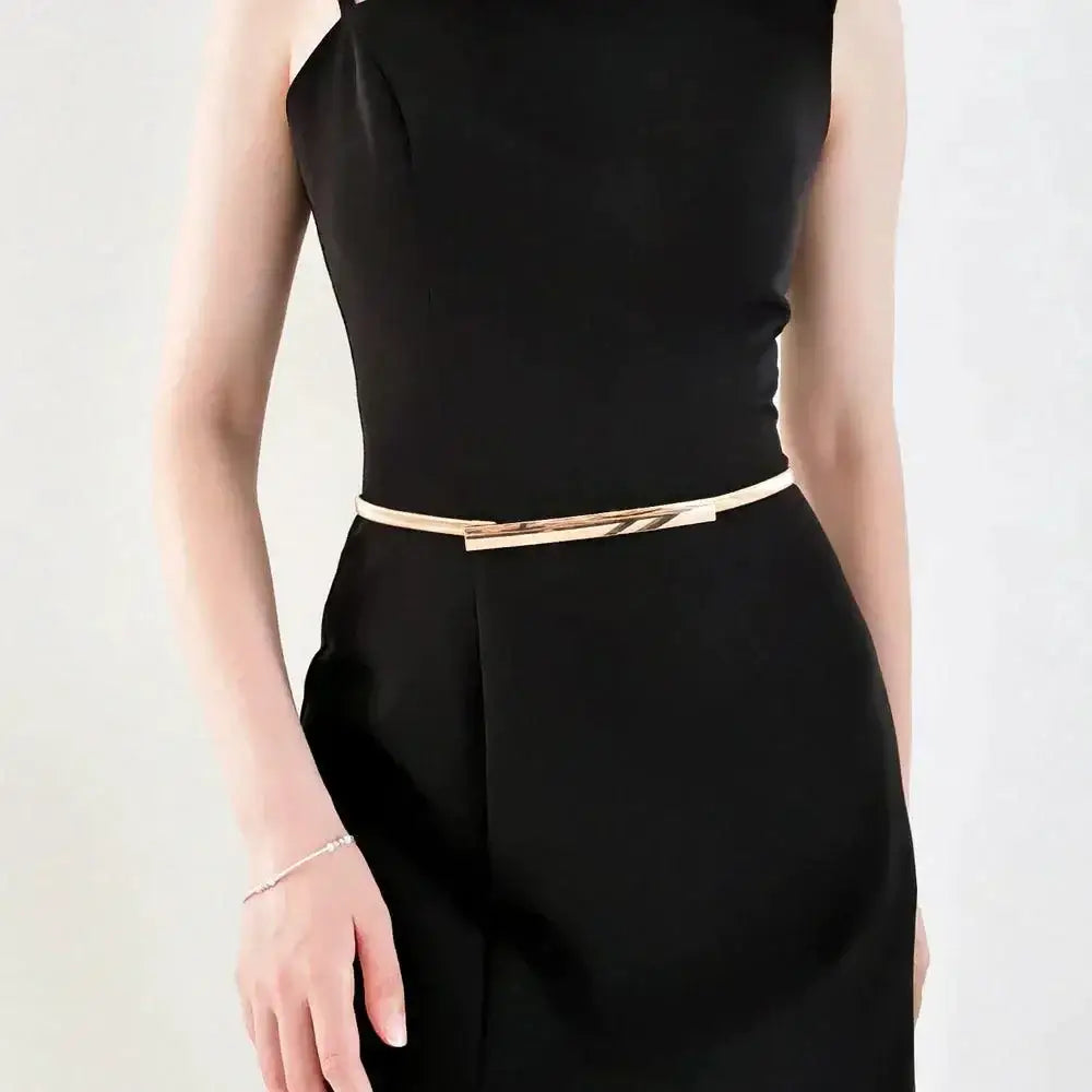 Sleeveless black dress with dhoxia slim belt featuring gold-toned metal buckle for elegance