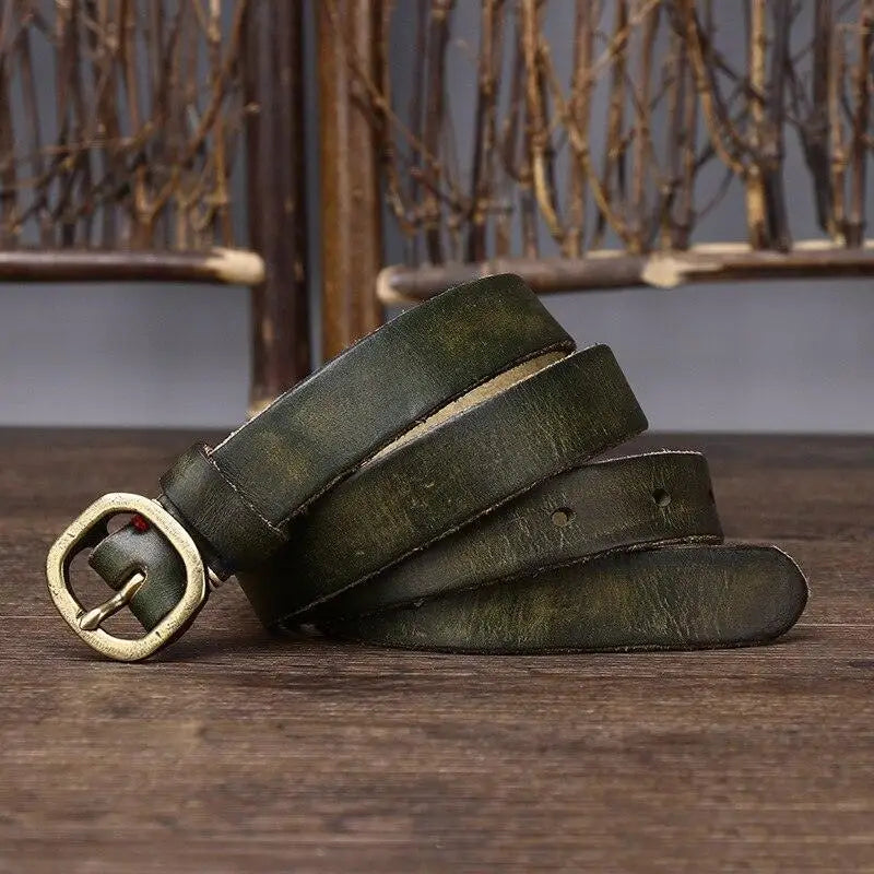 Assorted green leather belts with brass buckles displayed in a product lineup