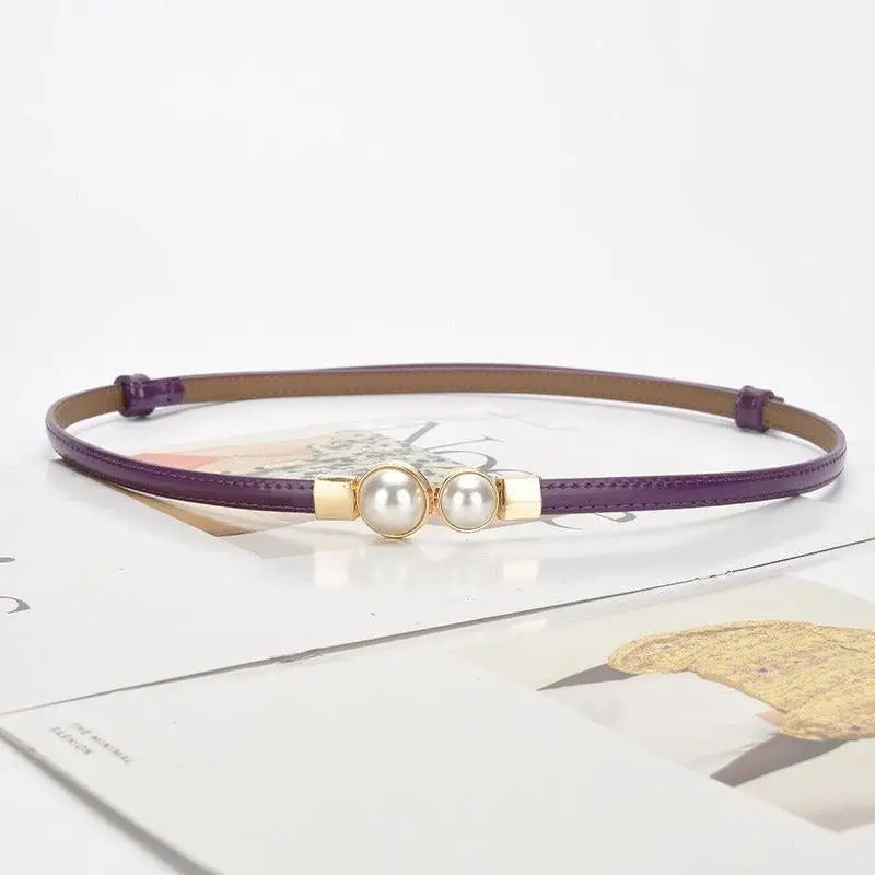 Purple women’s slim leather belt with pearl embellishments from Women’s Slim Leather collection