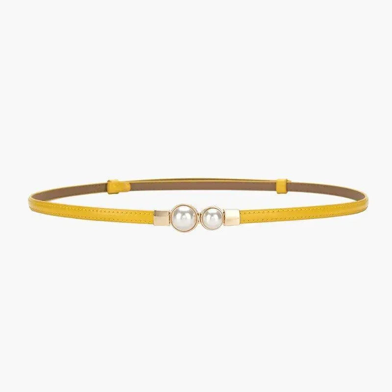 Yellow women’s slim leather belt with pearl embellishments and colorful accents