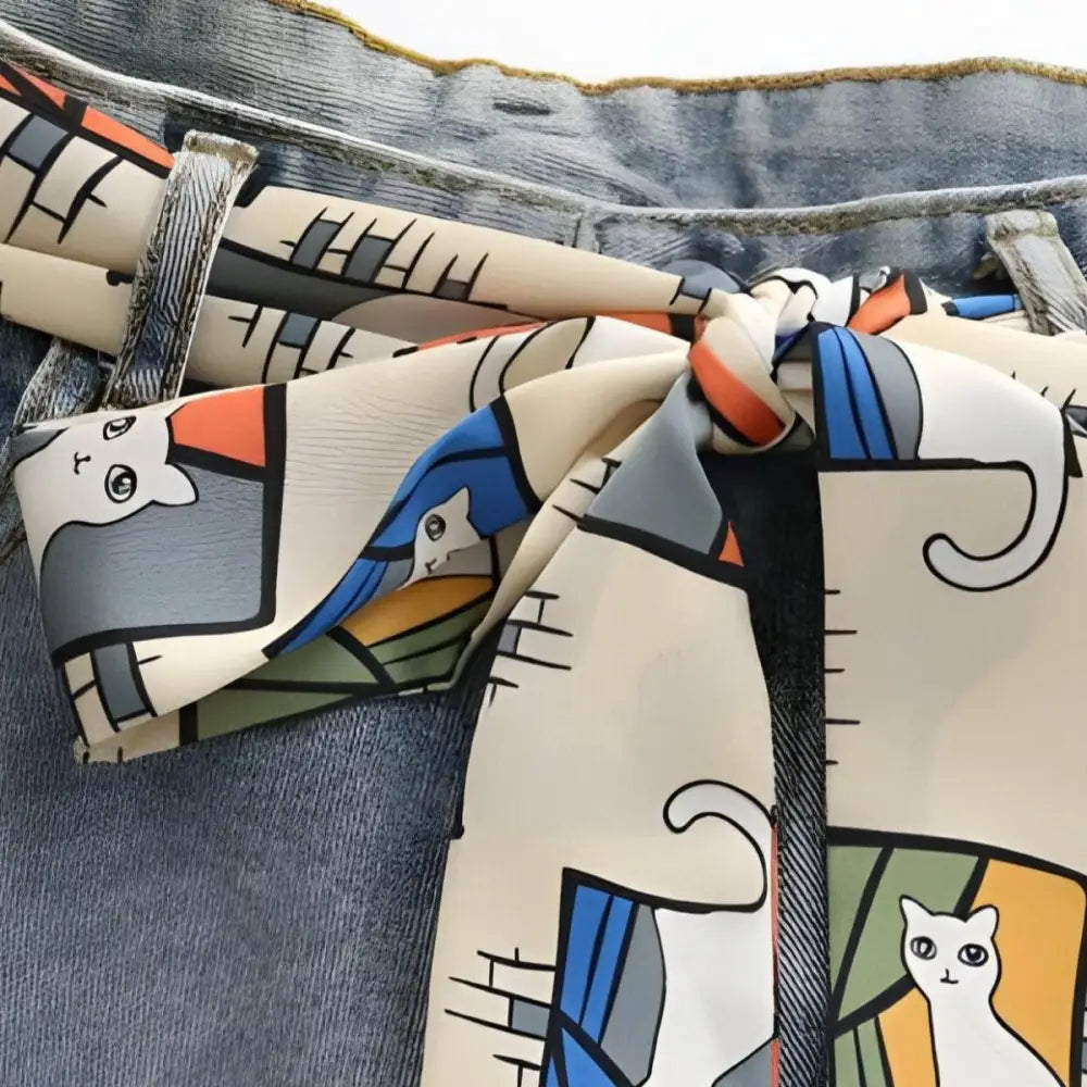 Cat-patterned Eutalia scarf belt tied on jeans, stylish accessory for denim shorts