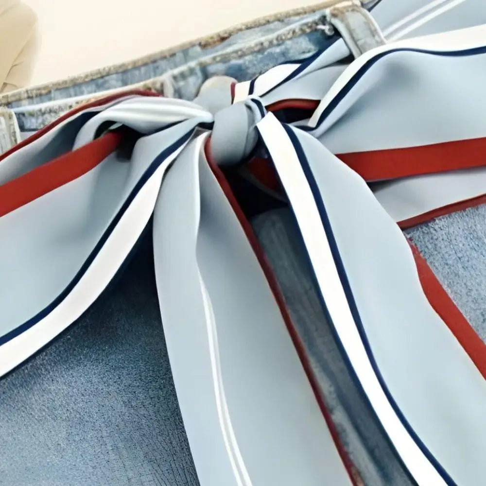 Denim jeans with tied ribbon scarf belt from Denim Fashion with Breeze Scarf Belt and Sea Breeze Scarf Accents