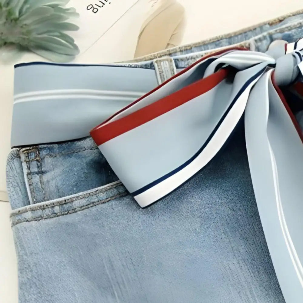 Light blue jeans with a tied Sea Breeze Scarf Belt and Breeze Scarf Accent