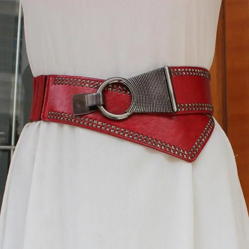 Red studded waist belt from Christina Belt with leather design and metal buckle