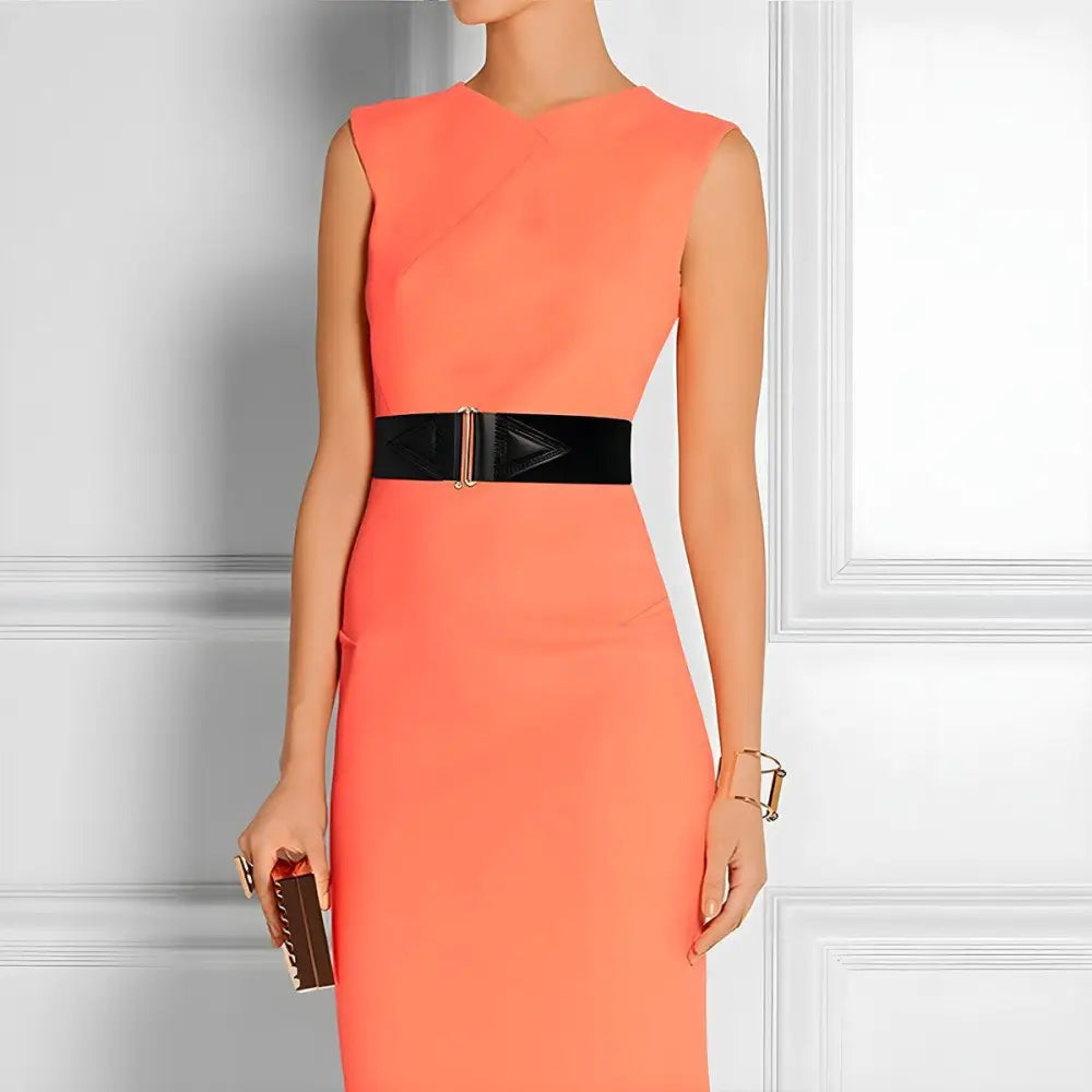 Sleeveless orange dress with black belt and Cassandra belt detail for stylish look