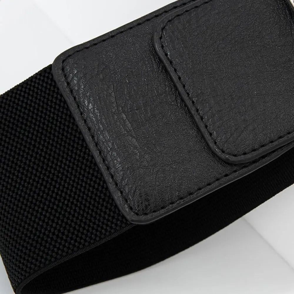 Black elastic belt with leather accent from the Eloisa Belt collection for Satin Black Dress