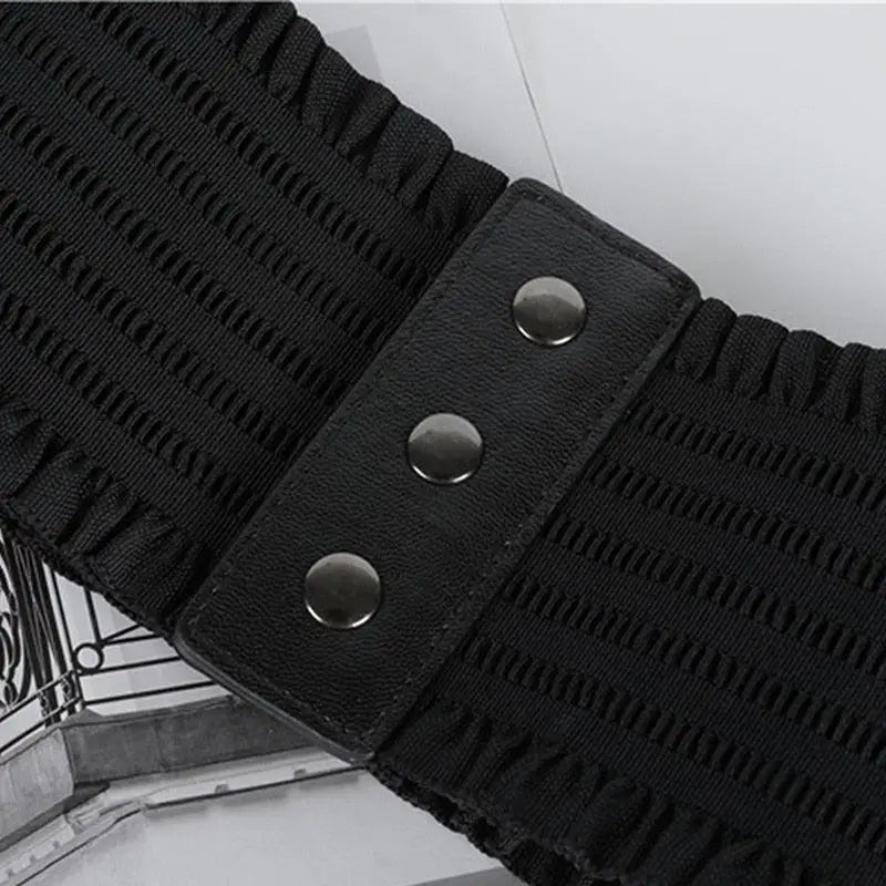 Black elastic belt with buttoned leather accent from White Elastic Waist Belt with Buttons and Black Corset Belts